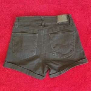 Black high-waisted midi jean shorts. Black denim. Size 0.